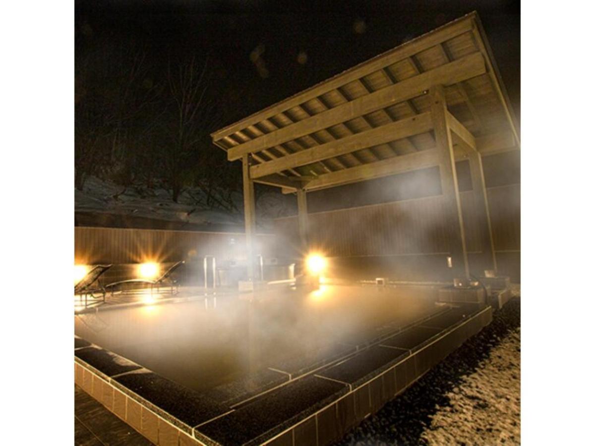 Ashibetsu Onsen Starlight Hotel Bagian luar foto