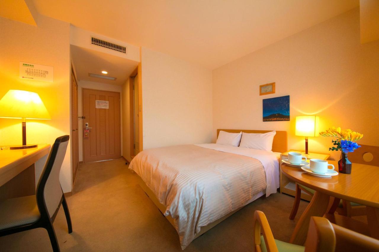 Ashibetsu Onsen Starlight Hotel Bagian luar foto