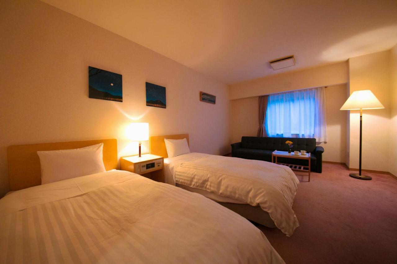Ashibetsu Onsen Starlight Hotel Bagian luar foto