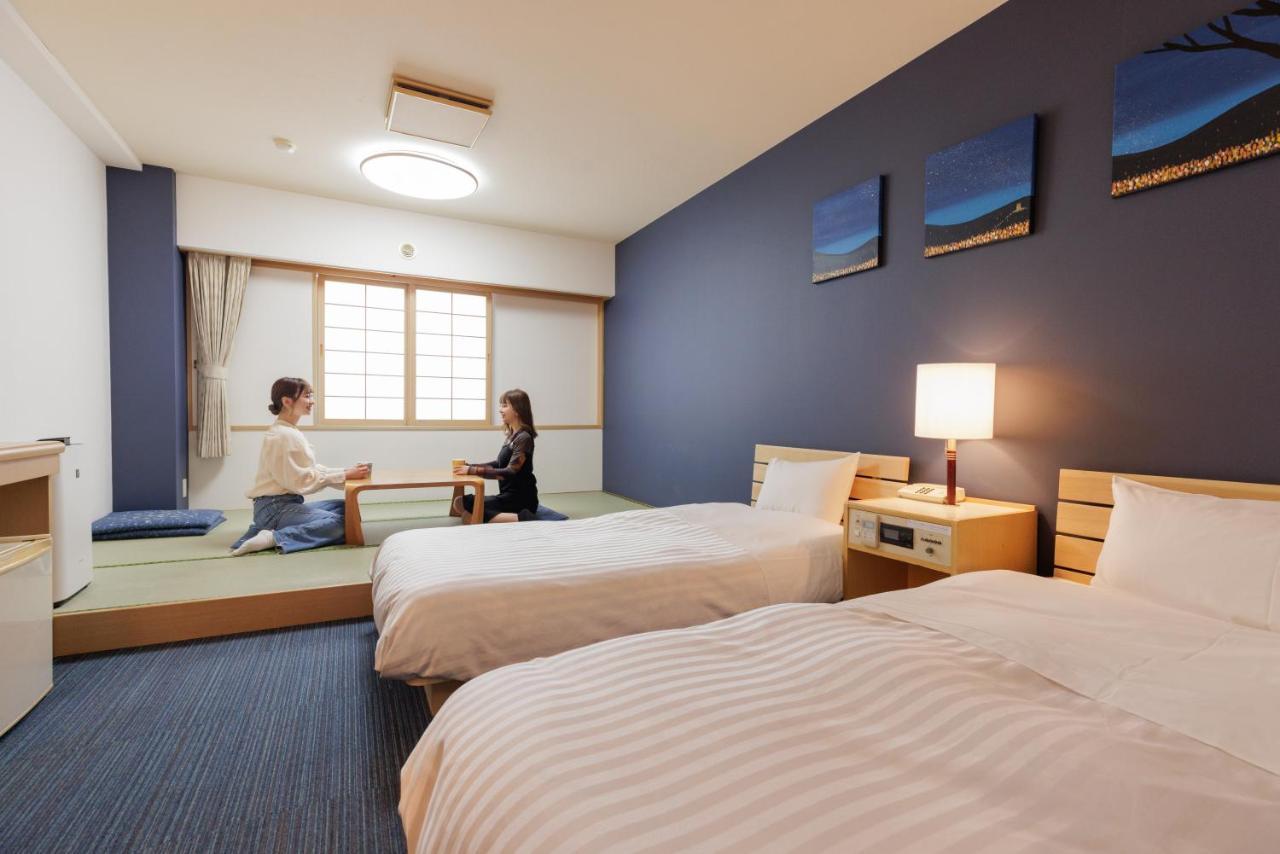 Ashibetsu Onsen Starlight Hotel Ruang foto