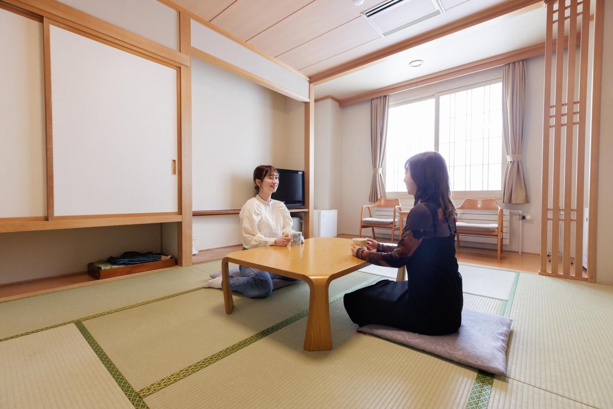 Ashibetsu Onsen Starlight Hotel Bagian luar foto