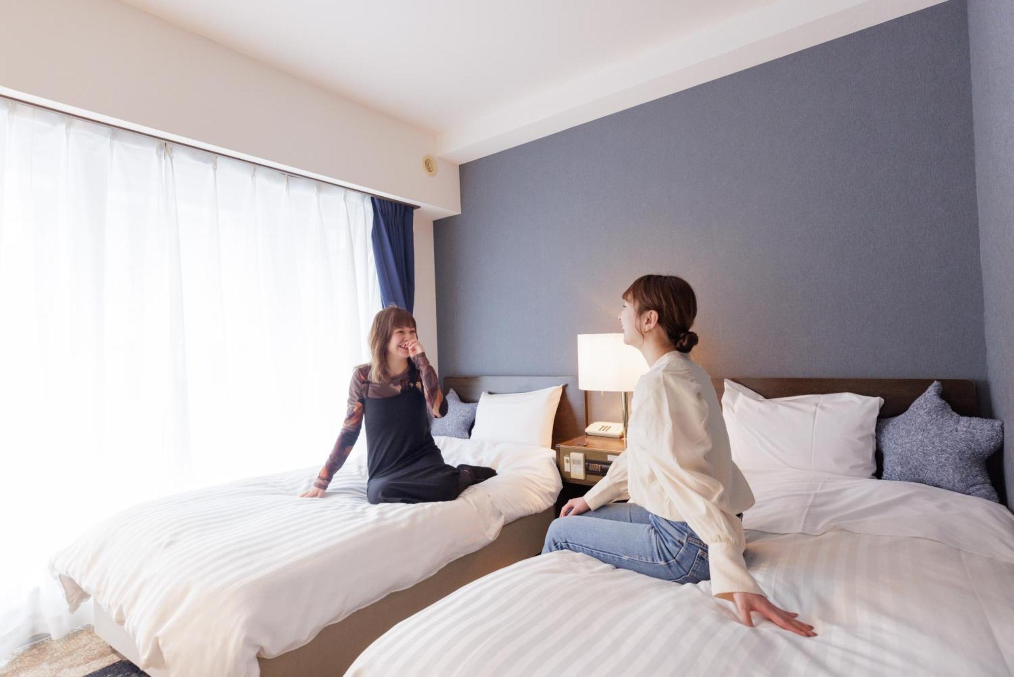 Ashibetsu Onsen Starlight Hotel Bagian luar foto