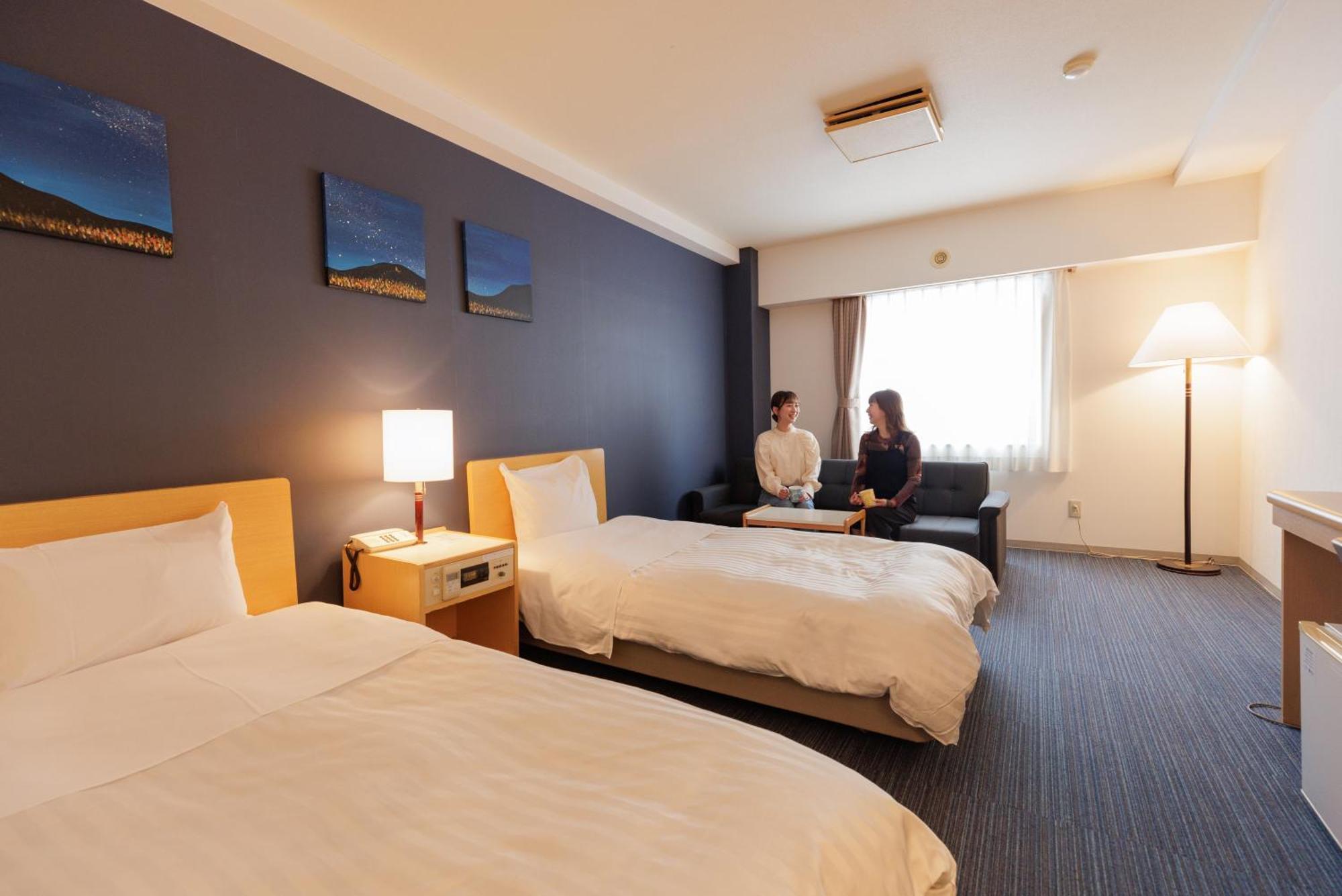 Ashibetsu Onsen Starlight Hotel Bagian luar foto