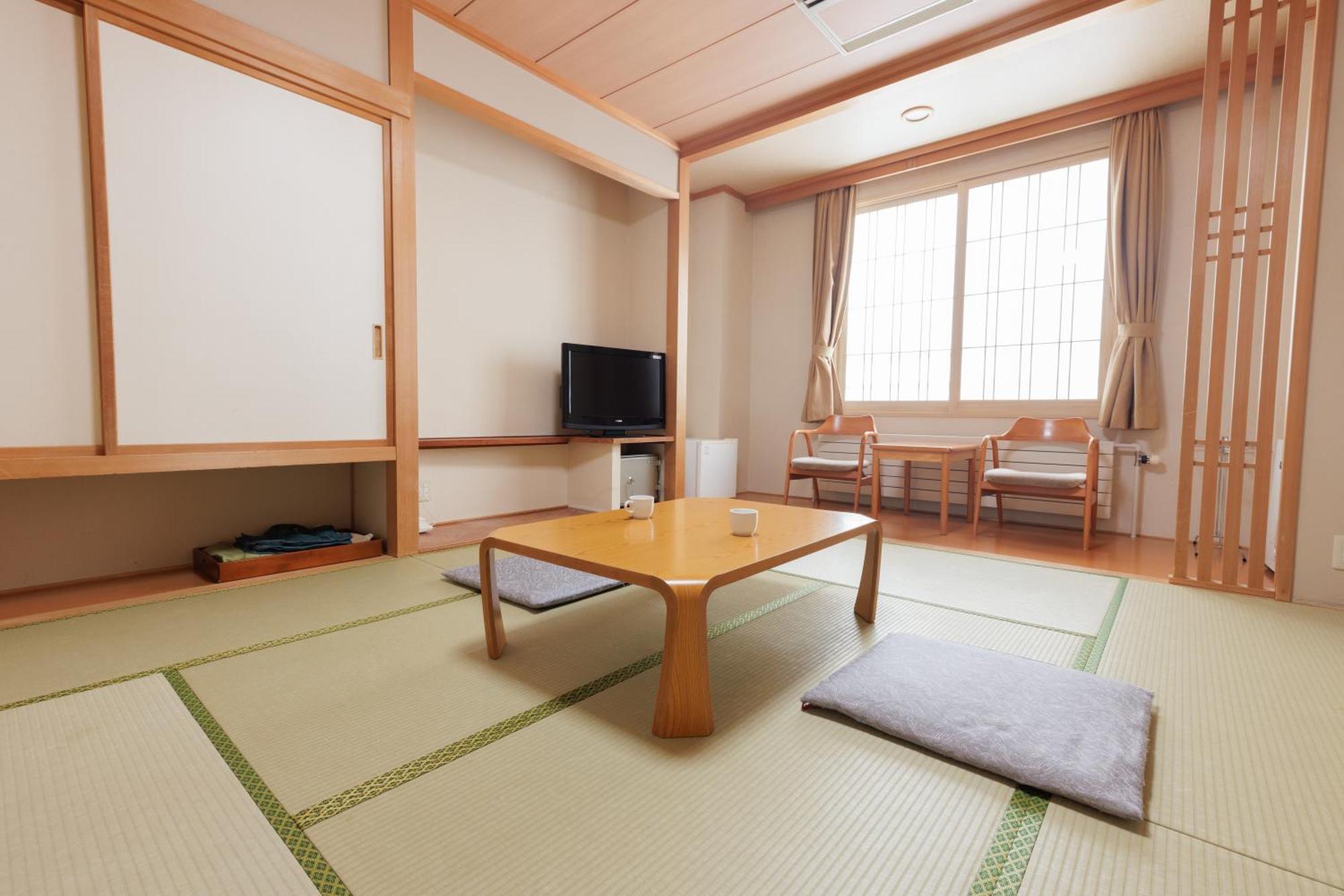Ashibetsu Onsen Starlight Hotel Bagian luar foto